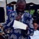 Eldest son, Victor Ezenwa reads the deceased's citation
