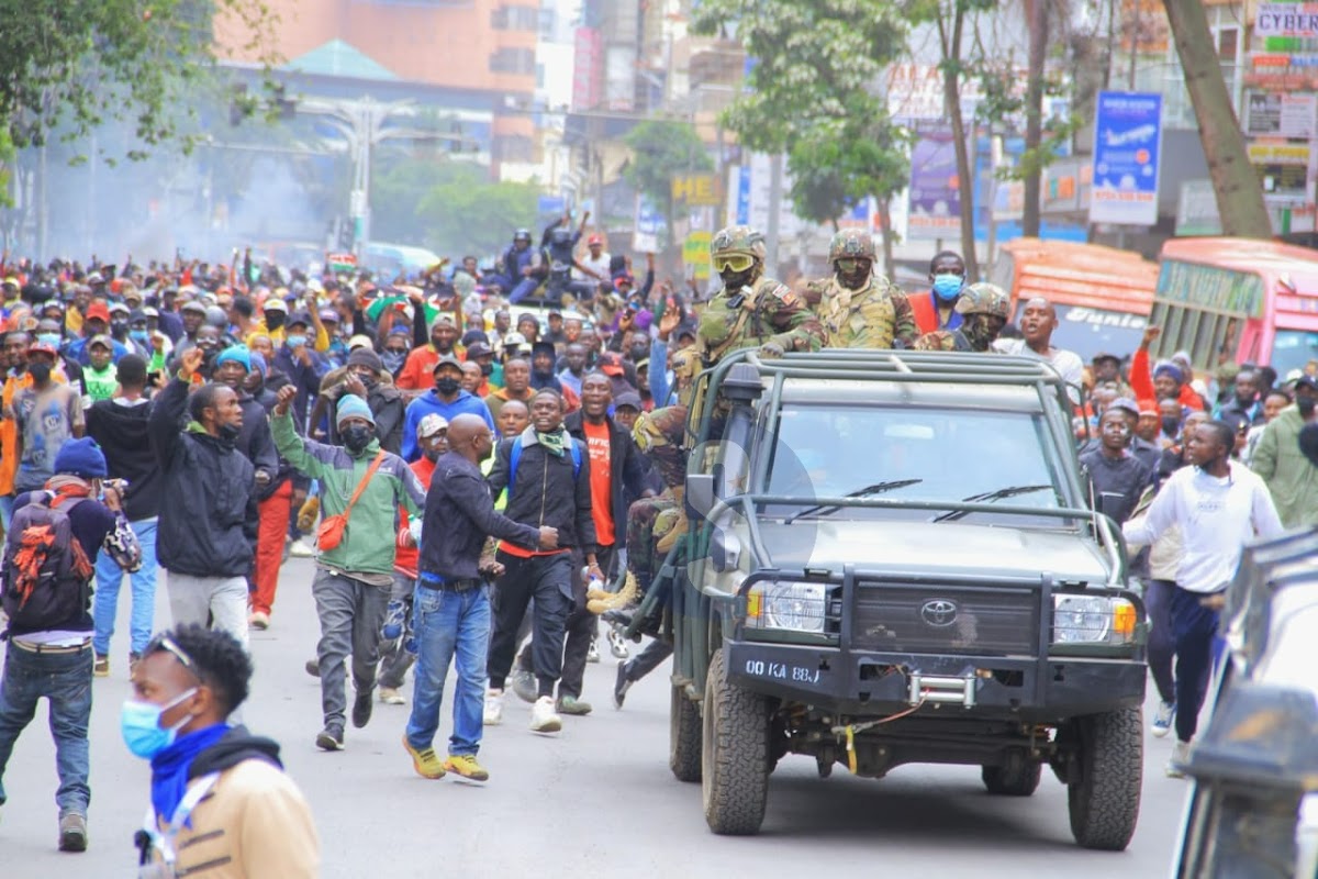kenya Kenyans cheer as the military patrols Nairobi streets during anti-Finance Bill demonstrations on June 27, 2024. Finance Bill